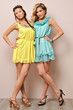 Two beautiful women in summer dresses.