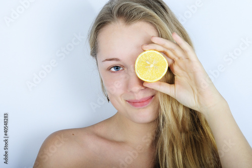 Photo: beautiful girl with citrus beautiful girl with citrus