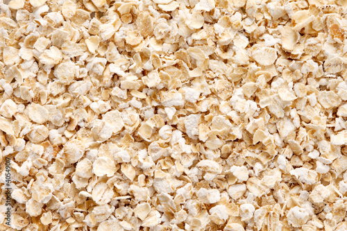 Photo: Oatmeal (rolled oats) background Oatmeal (rolled oats) background