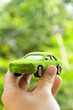 Hand Holding Eco car icon concept