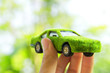 Hand Holding Eco car icon concept