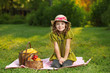 girl with fruit in park girl with fruit in park