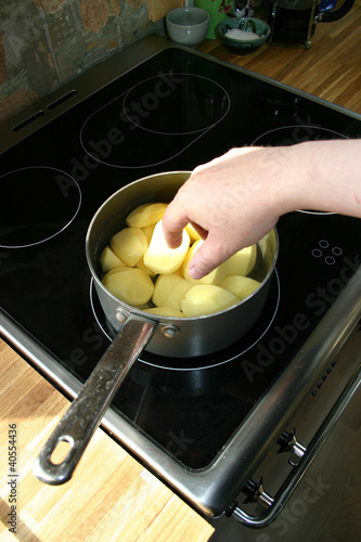 Photo: potatoes cooking saucepan potatoes cooking saucepan