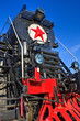 Old steam locomotive with red star