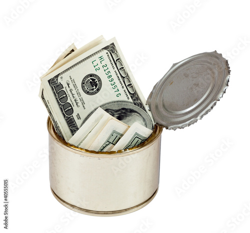 Photo: US dollars bills in metal can isolated on white US dollars bills in metal can isolated on white