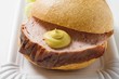 Leberkäse (a type of meatloaf) in a bread roll