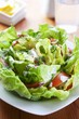 Lettuce with tomatoes and yogurt dressing