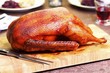 Roast goose on a chopping board