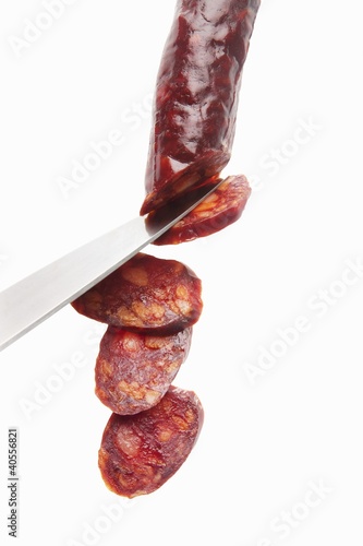 Foto: Chorizo being sliced Chorizo being sliced