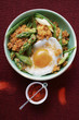 Quinoa with ajvar, green asparagus and fried egg
