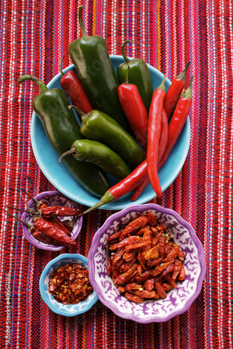 Photo: Fresh and dried chili peppers Fresh and dried chili peppers