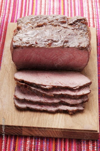 Photo: Roast beef on chopping board Roast beef on chopping board