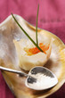 Filled won tons with trout caviare and fried quails egg