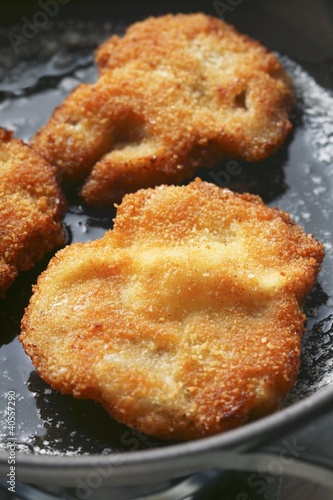 Photo: Wiener Schnitzel in frying pan Wiener Schnitzel in frying pan