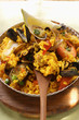 Paella with seafood and wedge of lemon