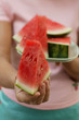 Photo: Woman holding wedge of watermelon Woman holding wedge of watermelon