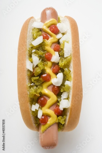 Photo: Hot dog with relish, mustard, ketchup and onions Hot dog with relish, mustard, ketchup and onions