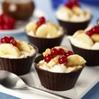 A cream dessert with bananas in chocolate cases