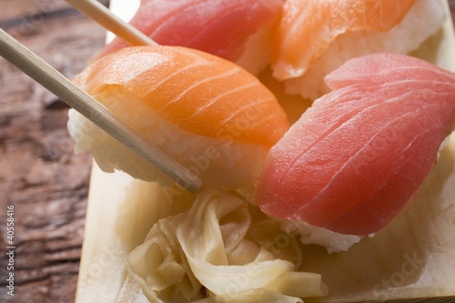 Photo: Nigiri sushi with chopsticks Nigiri sushi with chopsticks