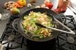 Vegetables in wok on hob, Asian ingredients behind