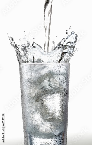 Photo: Pouring water into a glass Pouring water into a glass