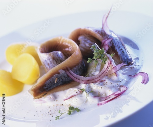 Photo: Matjes herrings with cream sauce and boiled potatoes Matjes herrings with cream sauce and boiled potatoes