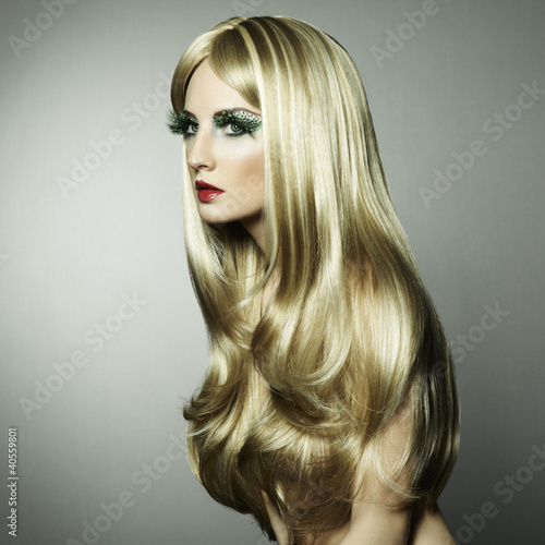 Photo: Portrait of a blond woman with long eyelashes Portrait of a blond woman with long eyelashes