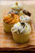 An assortment of decorated muffins