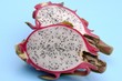 Two pitahaya (dragon fruit) halves