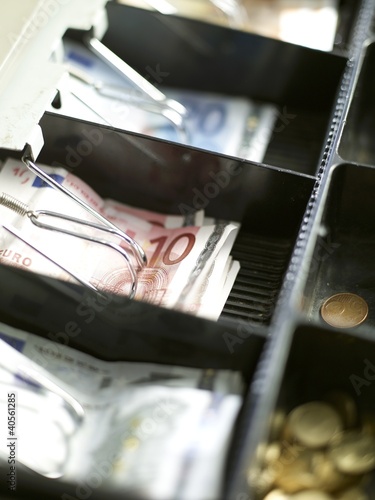 Photo: Opened till with notes and coins Opened till with notes and coins