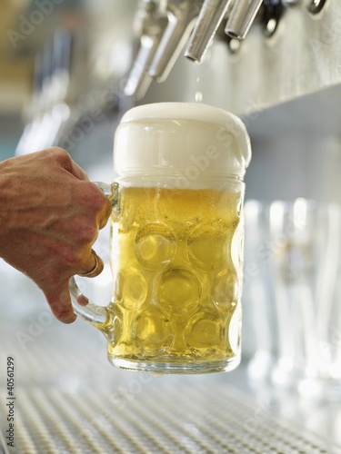 Photo: Pouring a litre of draught beer Pouring a litre of draught beer