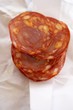 A few slices of chorizo (paprika sausage, Spain)
