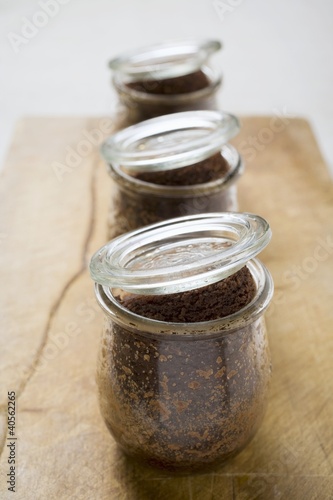 Photo: Three chocolate puddings, baked in jars Three chocolate puddings, baked in jars