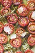 Tomatoes in olive oil with garlic and rosemary