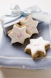 Cinnamon stars in front of Christmas gift