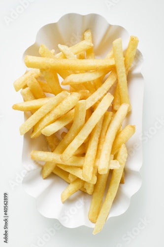 Photo: Chips in paper dish (overhead view) Chips in paper dish (overhead view)