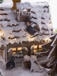 Gingerbread house with gingerbread animals and witch