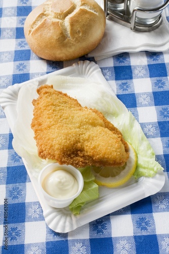 Photo: Fish fillet with mayonnaise and bread roll in snack bar Fish fillet with mayonnaise and bread roll in snack bar