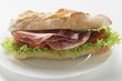Sausage, tomato and lettuce sandwich