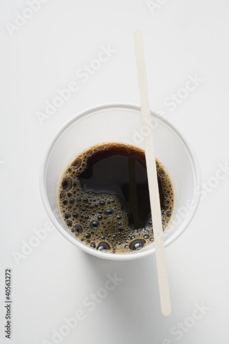 Photo: Black coffee in plastic cup (overhead view) Black coffee in plastic cup (overhead view)