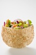 Bread filled with vegetables, lettuce and feta