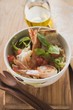 Vegetable salad with fried scampi