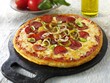 Pepperoni pizza with chilli rings and onions