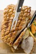 Roast belly pork with crackling and vegetables