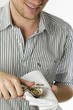 Man opening a fresh oyster