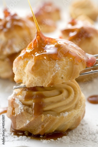 Photo: Caramelised profiterole with cream filling Caramelised profiterole with cream filling