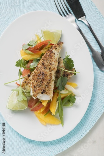Photo: Spicy pangasius fillet with vegetables, lime, coriander Spicy pangasius fillet with vegetables, lime, coriander