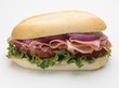 Ham, salami, onion, tomato and lettuce sandwich
