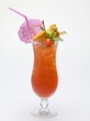 Cocktail with exotic fruit skewer and umbrella
