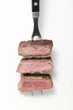 Rump steak cooked to different degrees (rare, medium, well done)